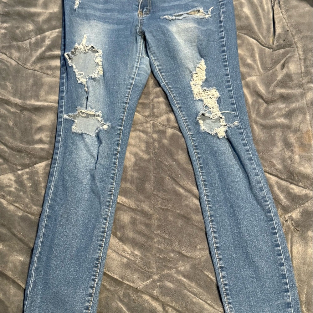Distressed Blue Jeans